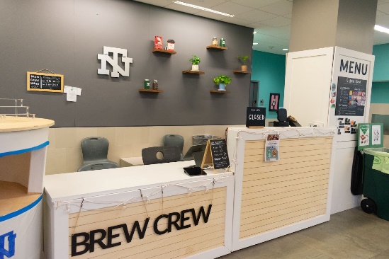 A reception desk in a buildingDescription automatically generated
